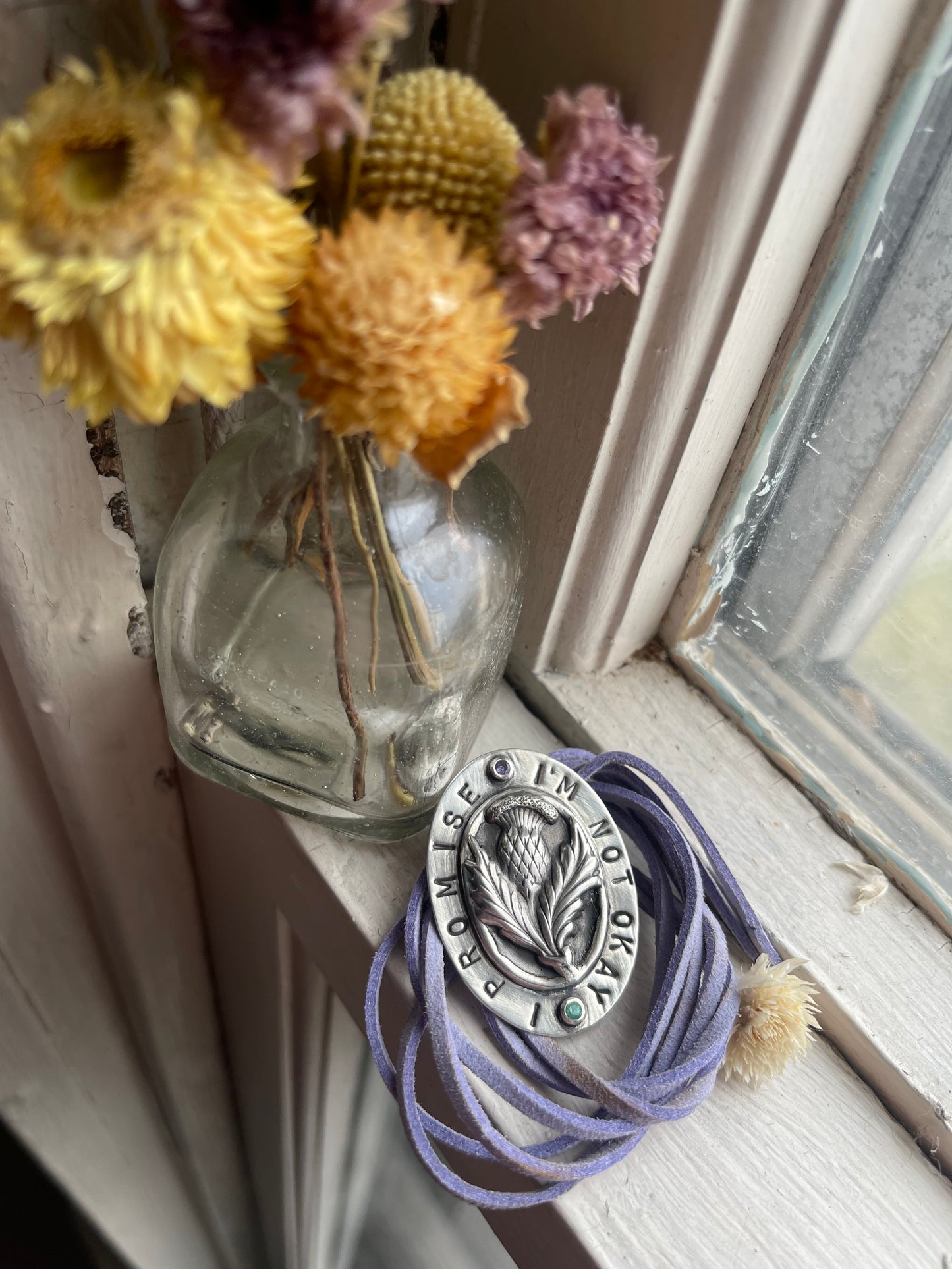 *I’m Not Okay, I Promise • Tanzanite & Emerald Stamped Sterling Silver Thistle Pendant