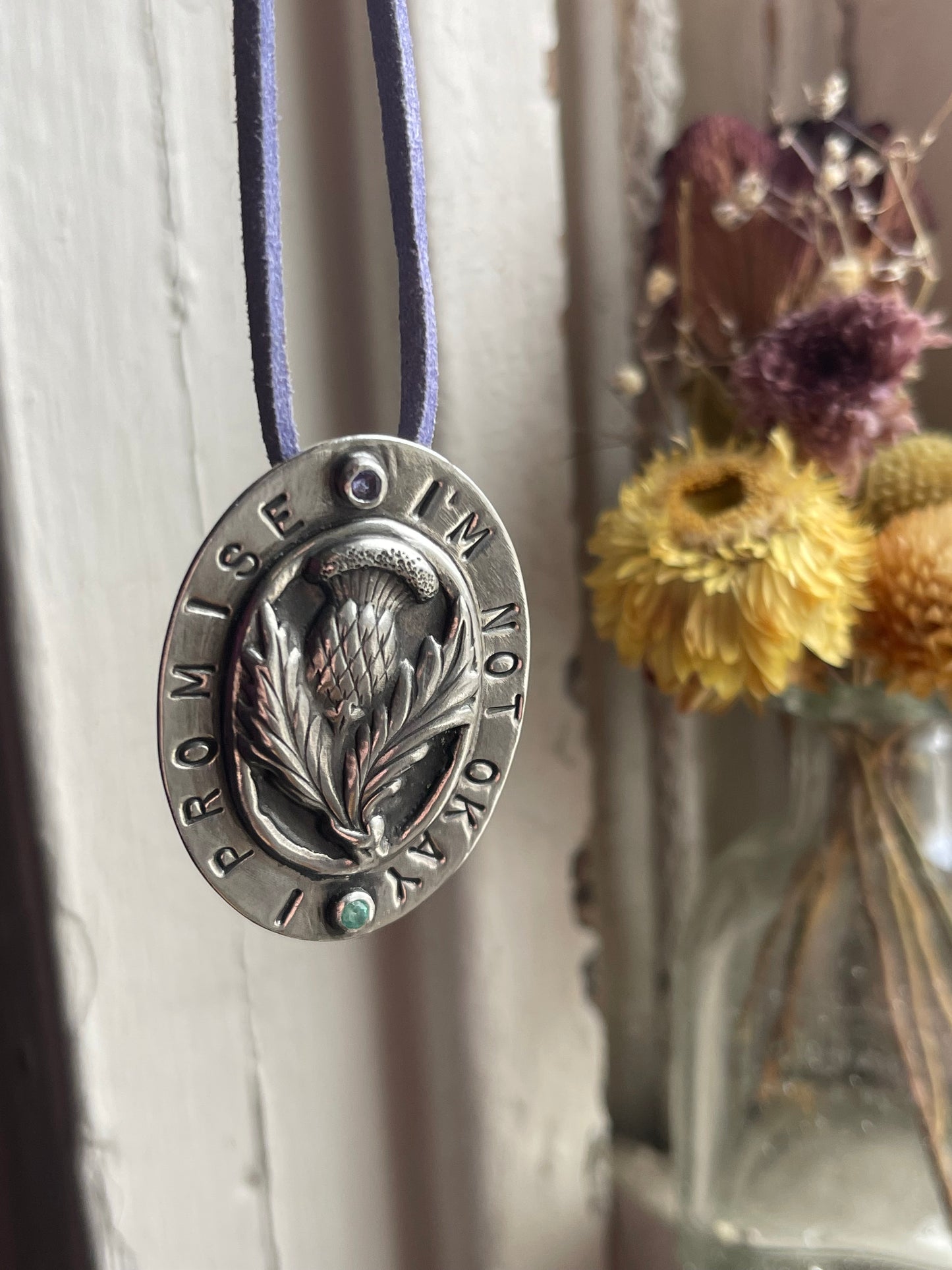 *I’m Not Okay, I Promise • Tanzanite & Emerald Stamped Sterling Silver Thistle Pendant