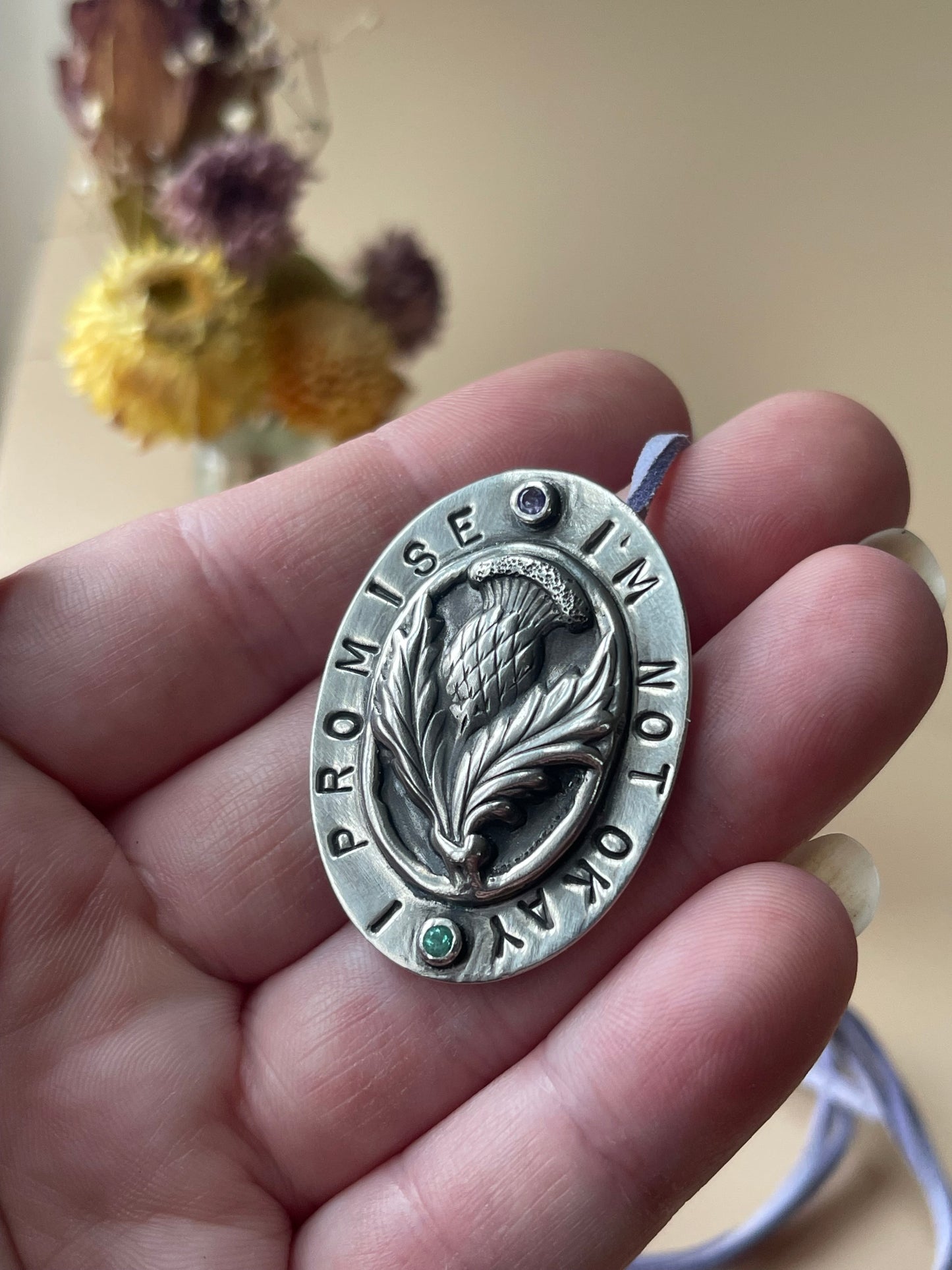 *I’m Not Okay, I Promise • Tanzanite & Emerald Stamped Sterling Silver Thistle Pendant